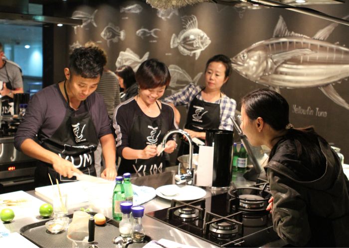 Sydney Seafood School, Sydney Fish Market Small group enjoying a cooking class at the Sydney Seafood school, Sydney Fish Market